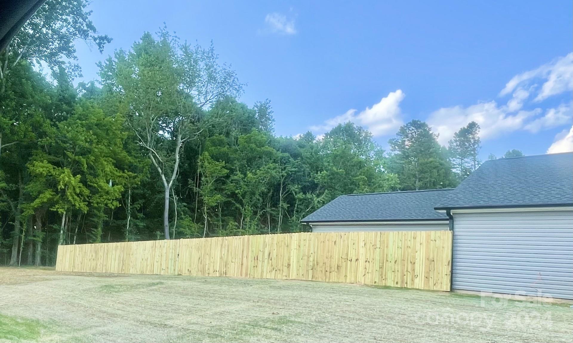 525 Blacksnake Road Stanley, NC 28164 - Photo 4 of 21 a view of a swimming pool with a patio
