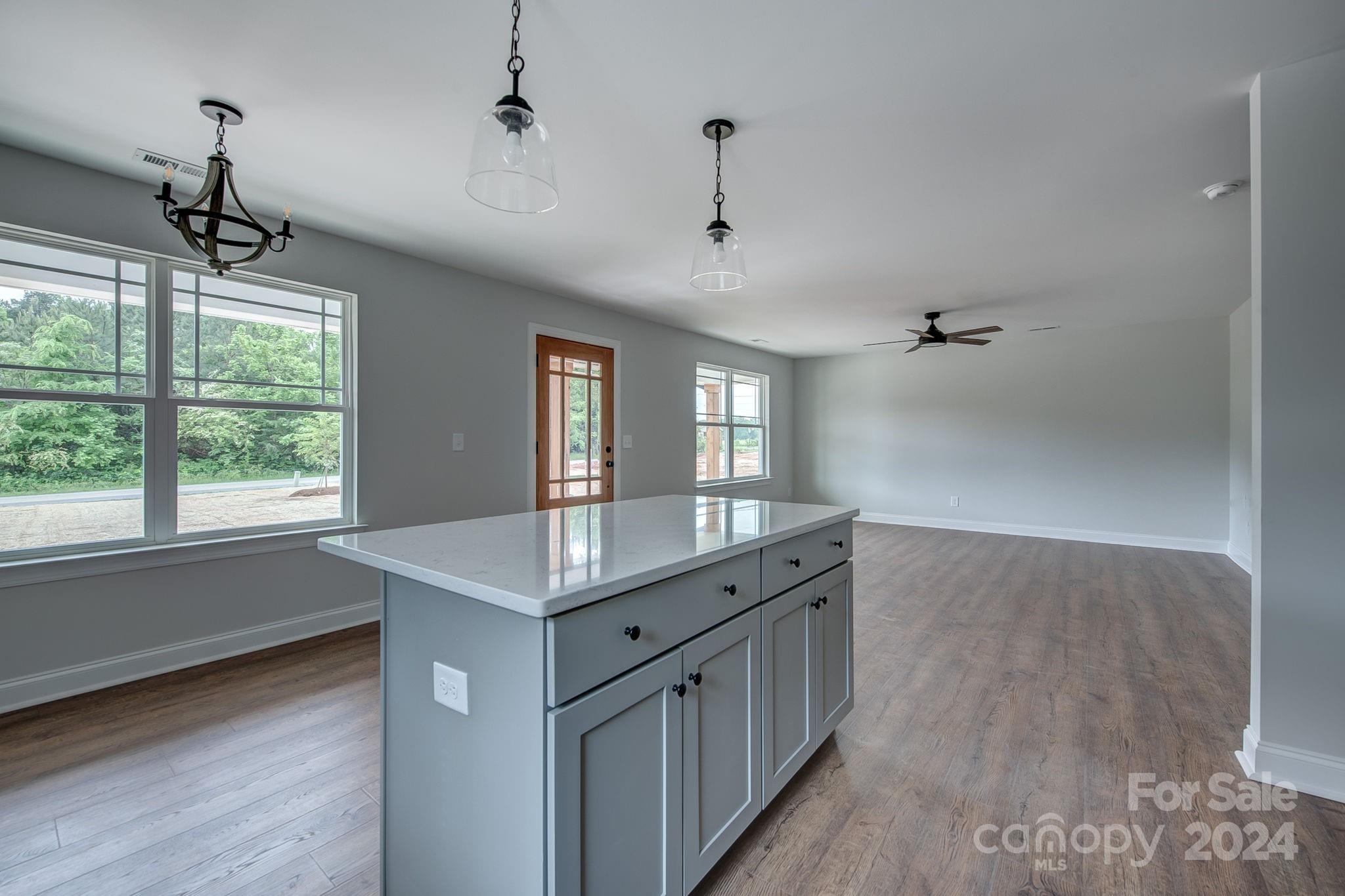 525 Blacksnake Road Stanley, NC 28164 - Photo 7 of 21 a bathroom with a sink a large mirror and a bathtub