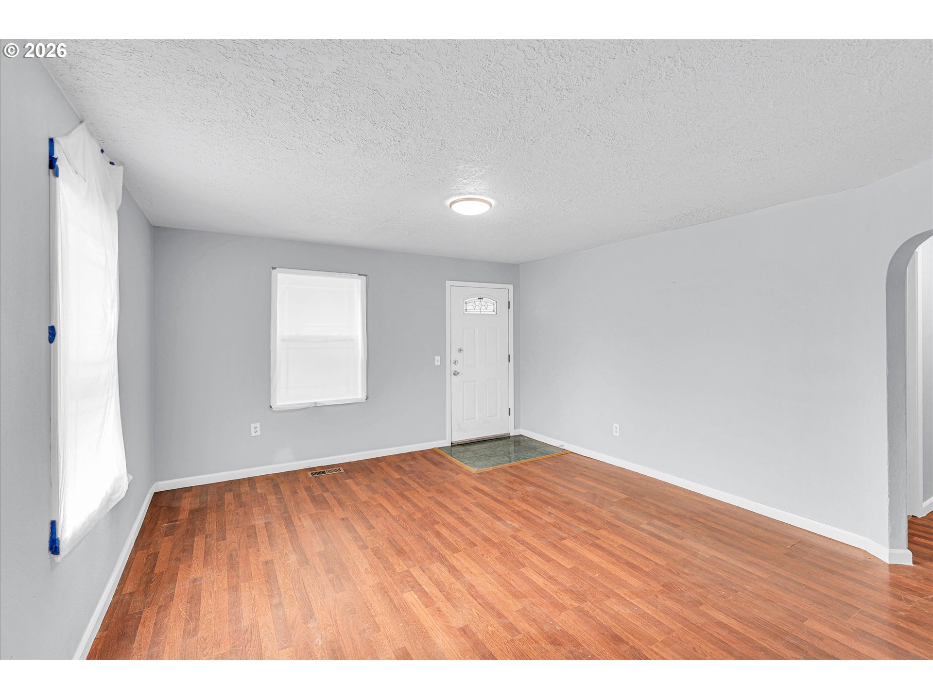 14125 Southeast Division Street Portland, OR 97233 - Photo 17 of 17 a view of an empty room and window