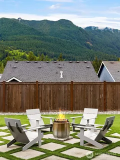 a view of backyard with seating space