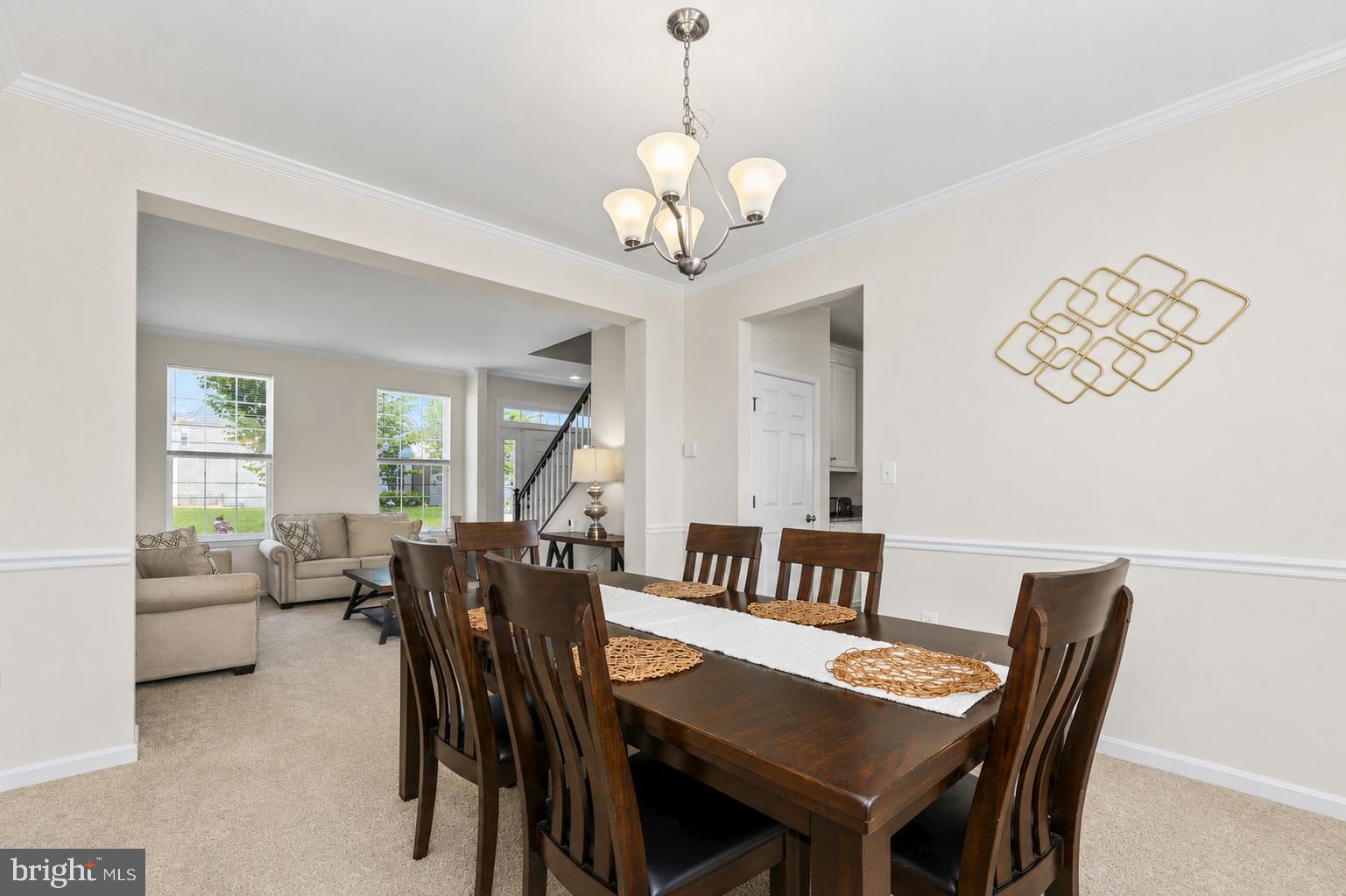 16183 Raptor Crest Lane Woodbridge, VA 22193 - Photo 8 of 51 Elegant dining space with natural light.