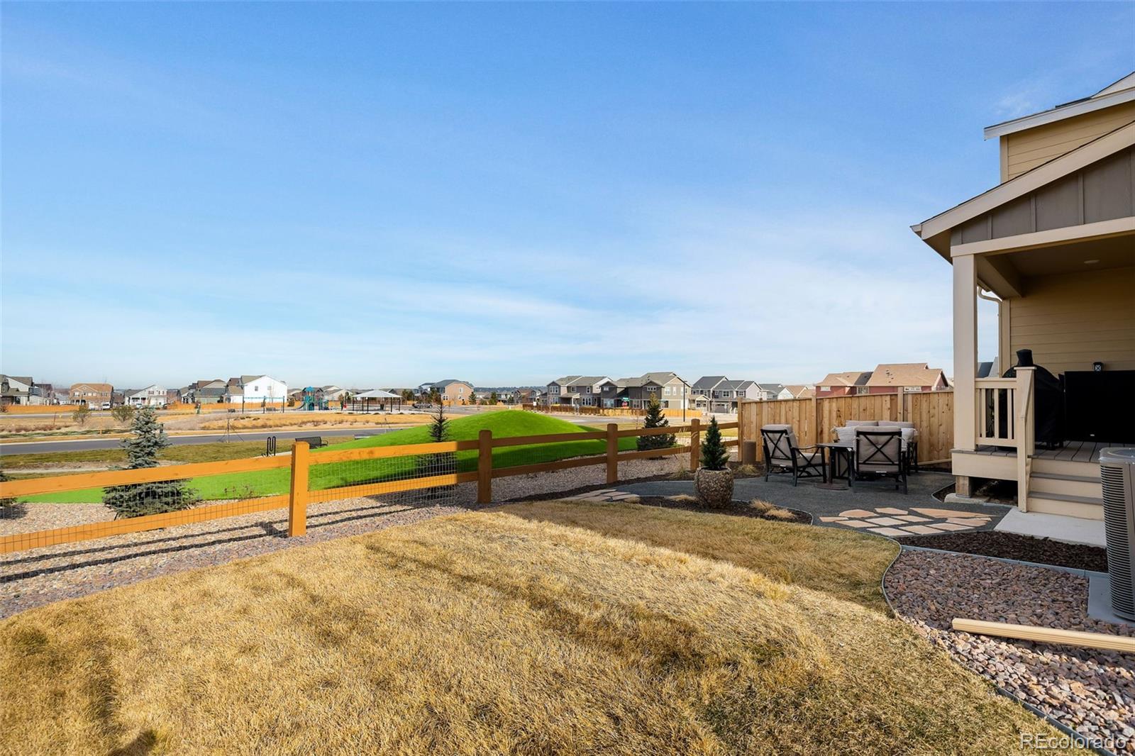 16249 Laurentide Place Parker, CO 80134 - Photo 28 of 30 a view of a terrace with city view