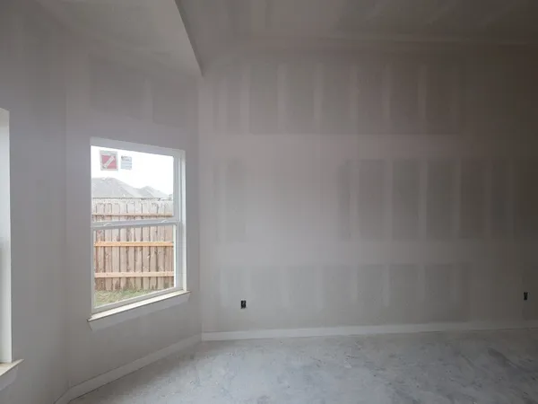 an empty room with a window