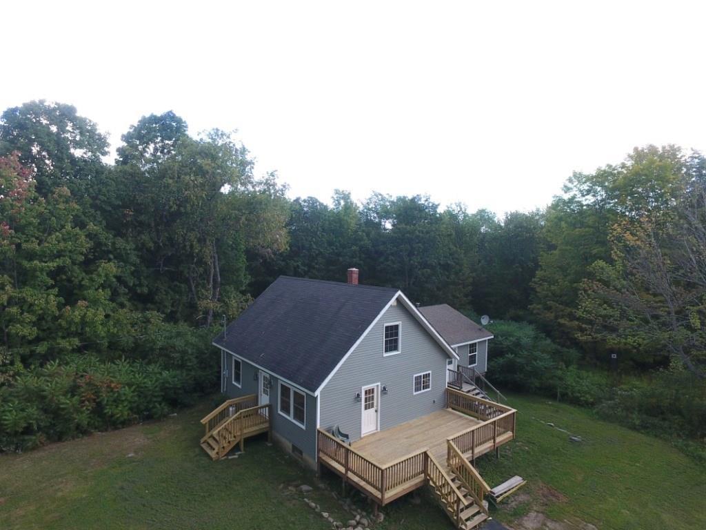 59 Swan Road New Sharon, ME 04955 - Photo 1 of 35 Aerial view of the home with a...