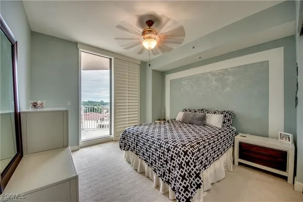 a bathroom with a double vanity sink toilet and shower