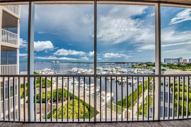 a view of a balcony with a floor to ceiling window window
