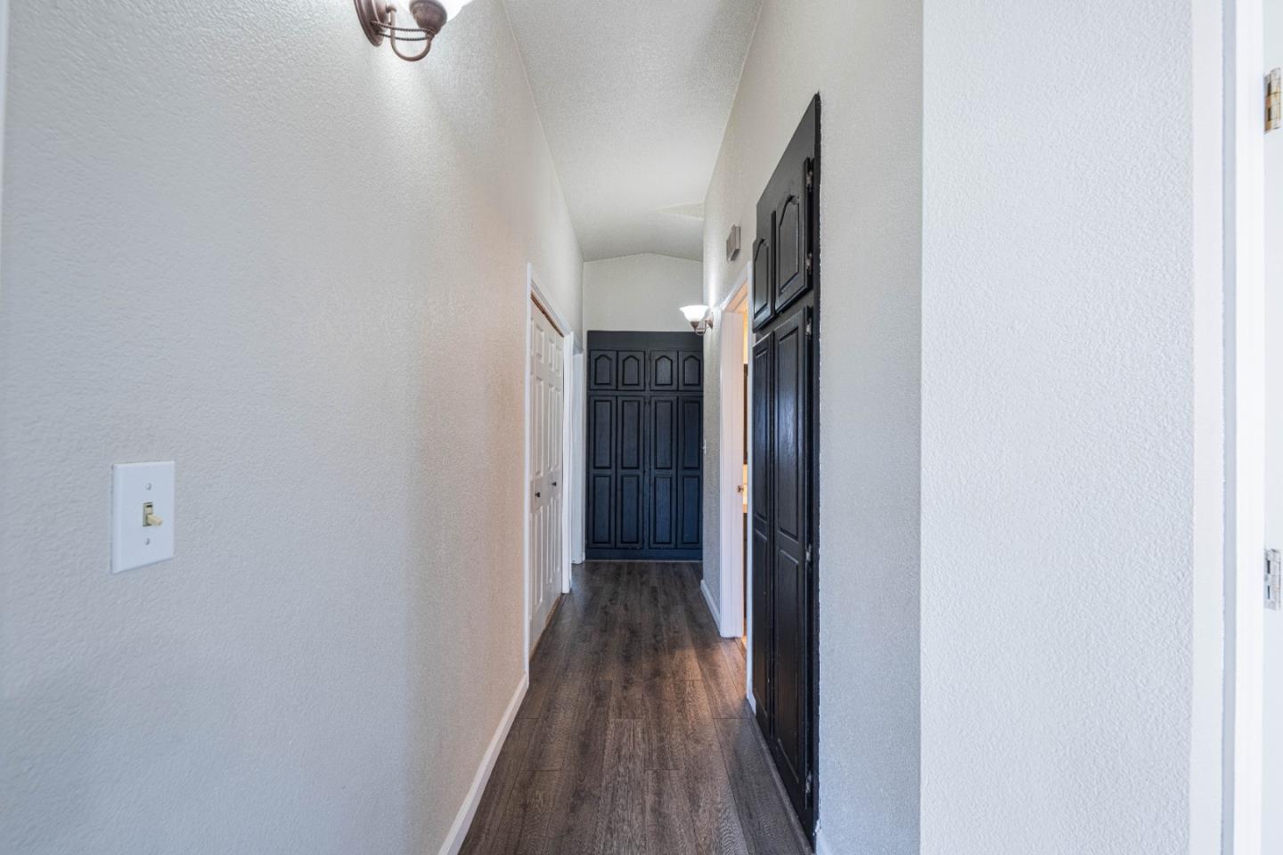 890 Sloat Drive Salinas, CA 93907 - Photo 13 of 37 a view of a hallway with wooden floor