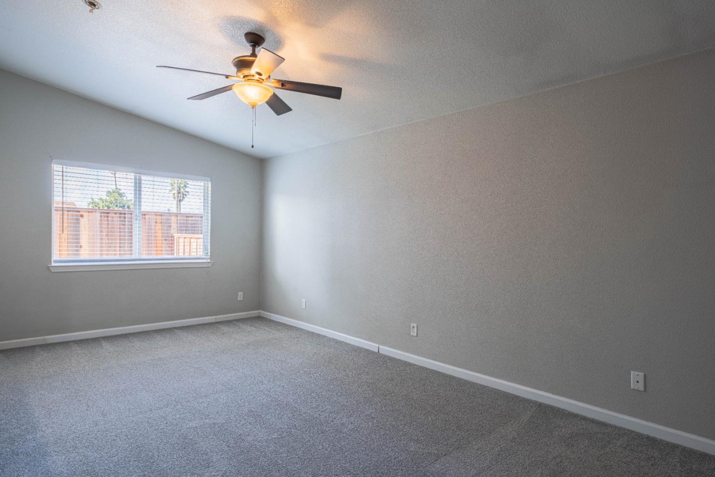 890 Sloat Drive Salinas, CA 93907 - Photo 23 of 37 a view of an empty room with a window
