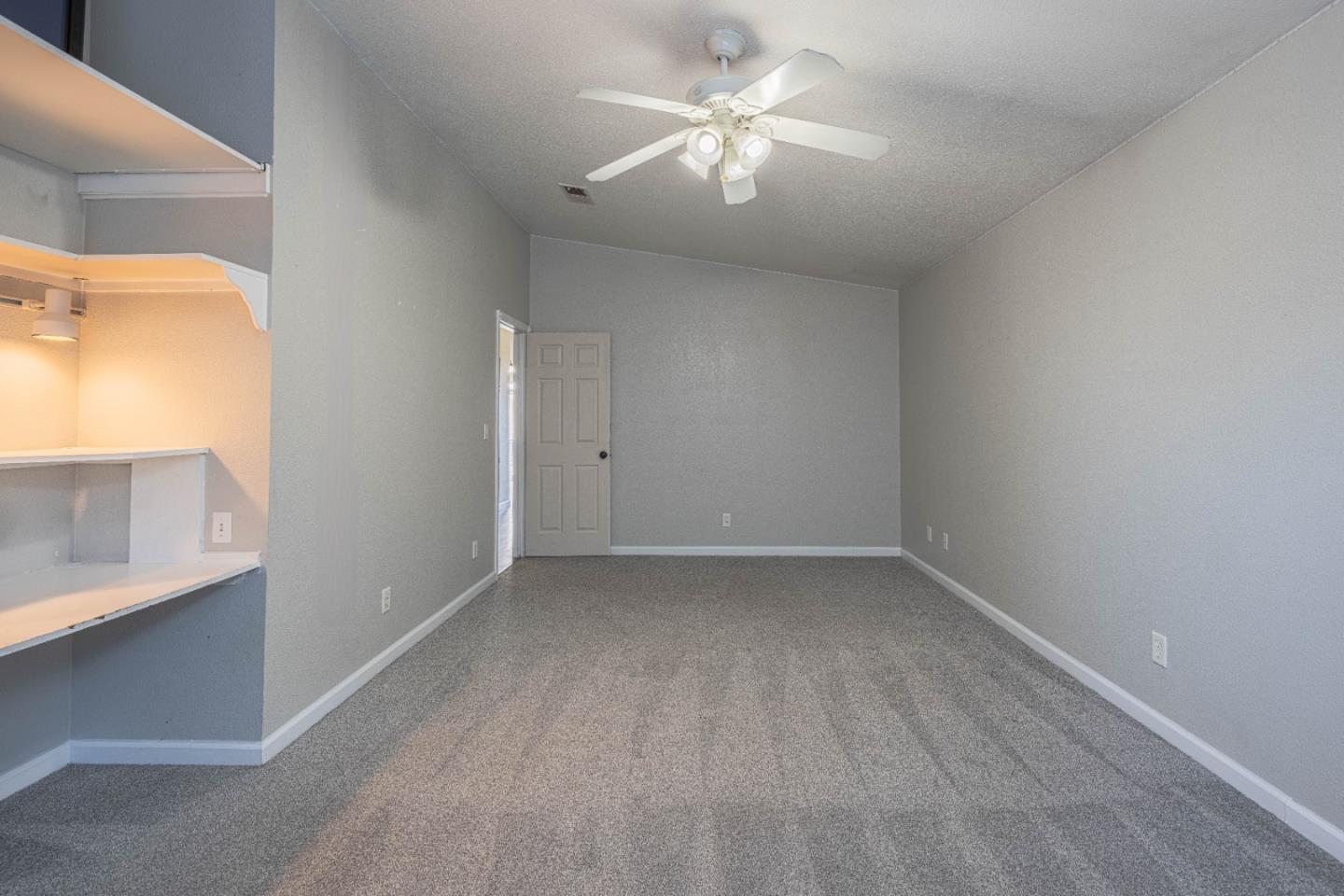 890 Sloat Drive Salinas, CA 93907 - Photo 26 of 37 wooden floor in an empty room with a window