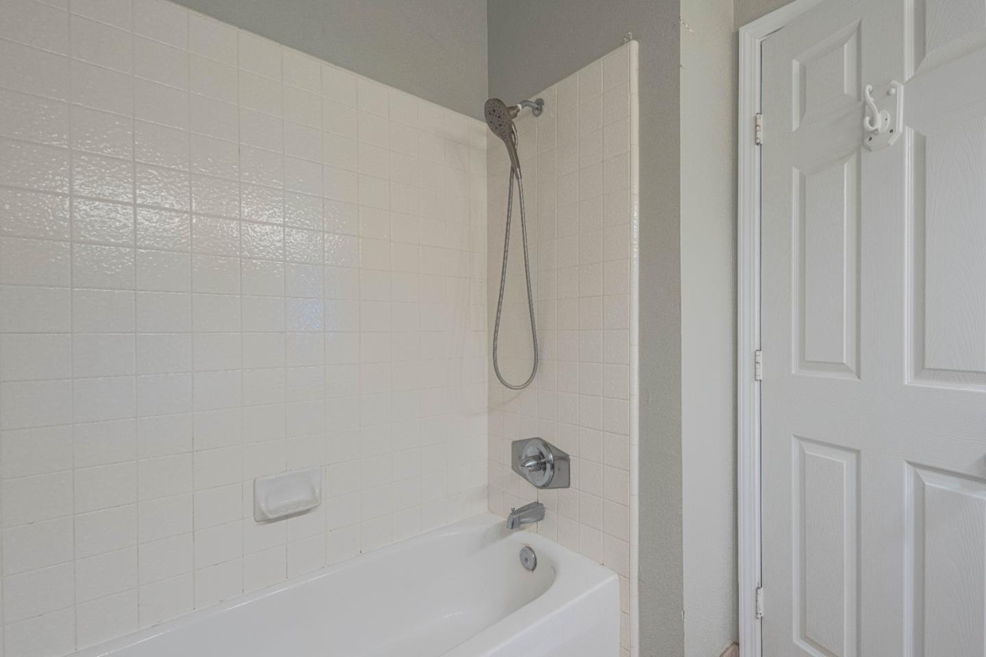 890 Sloat Drive Salinas, CA 93907 - Photo 28 of 37 a bathroom with a shower and a bath tub