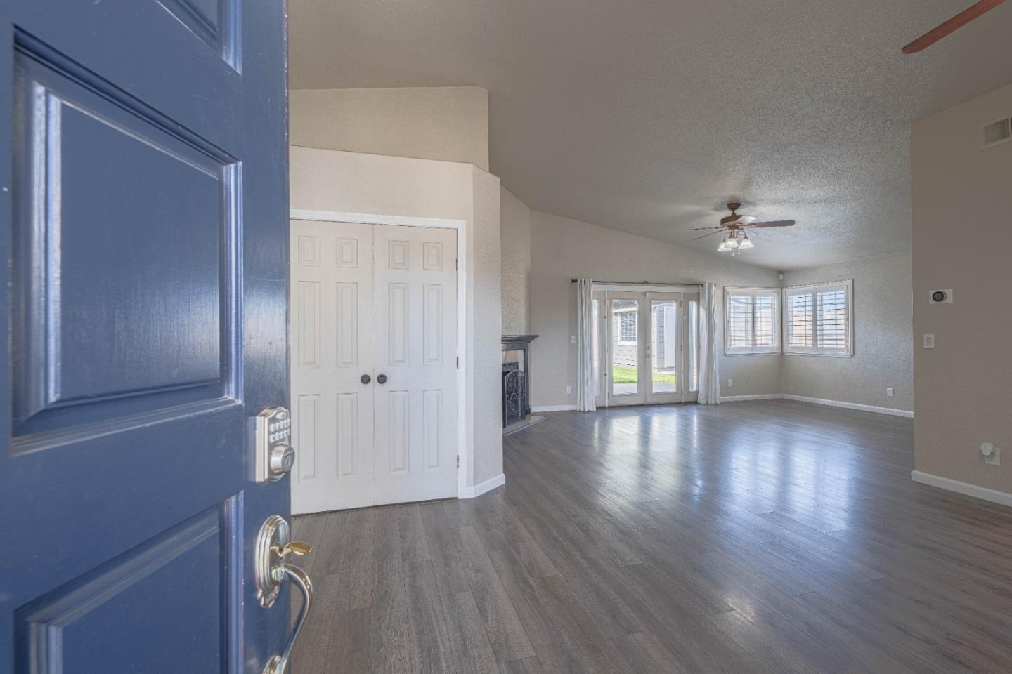 890 Sloat Drive Salinas, CA 93907 - Photo 3 of 37 wooden floor in an empty room with a window