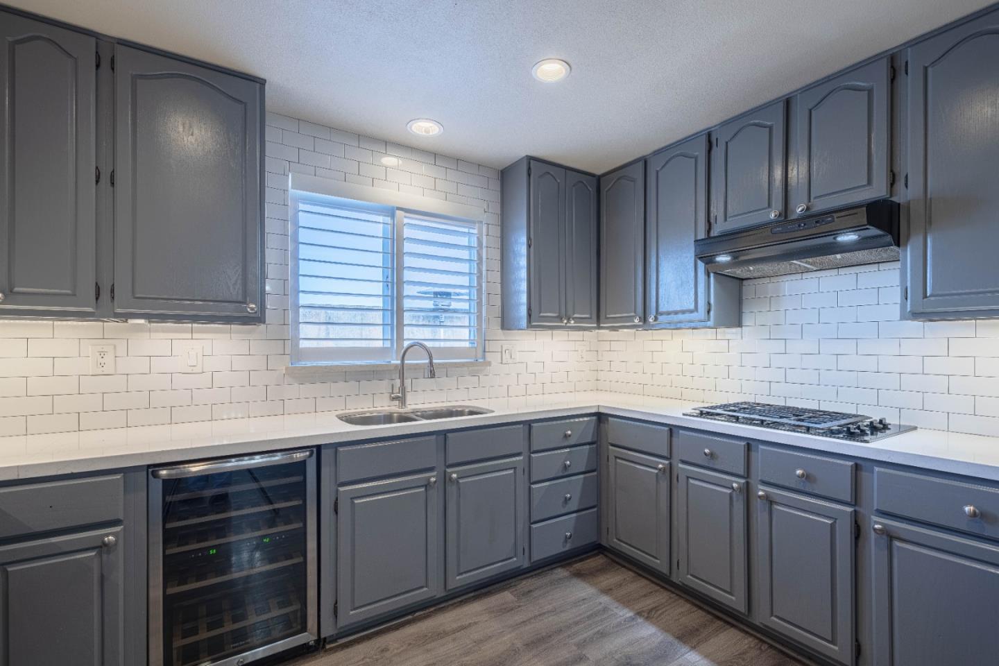 890 Sloat Drive Salinas, CA 93907 - Photo 10 of 37 a kitchen with stainless steel appliances granite countertop wooden cabinets and a sink