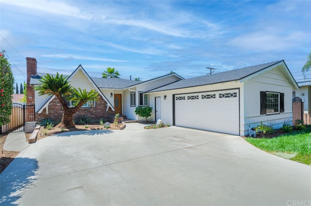3310 Fish Canyon Road Duarte, CA 91010 - Photo 1 of 1 a front view of a house with a yard and garage