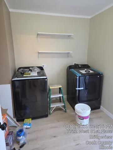 a bathroom with a stove and a mirror