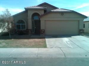3045 West Grenadine Road Phoenix, AZ 85041 - Photo 1 of 1 a front view of a house