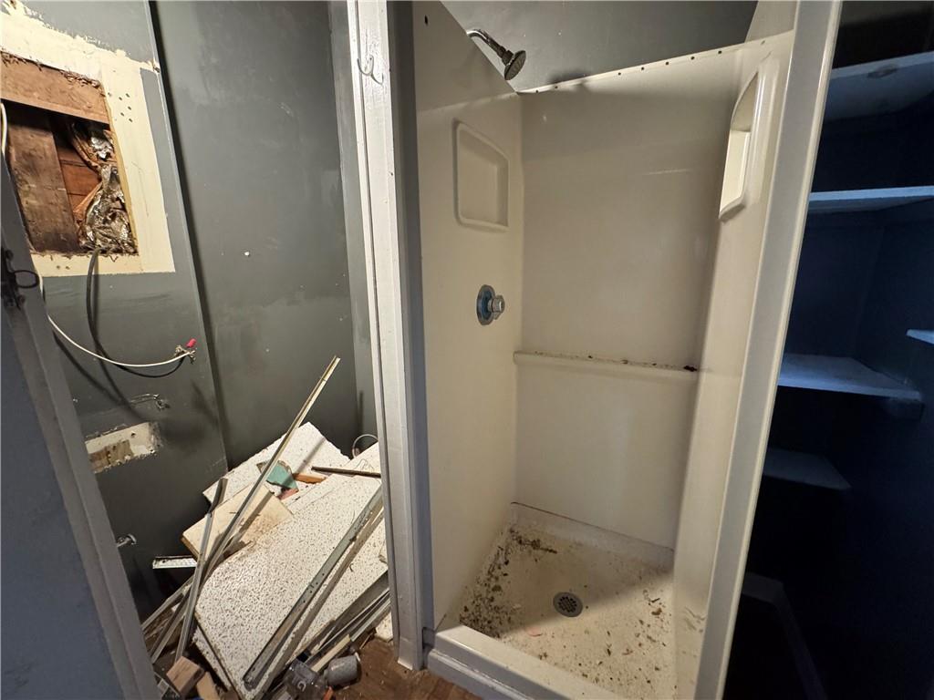 221 Singer Avenue McKees Rocks, PA 15136 - Photo 6 of 23 a bathroom with a sink toilet and shower