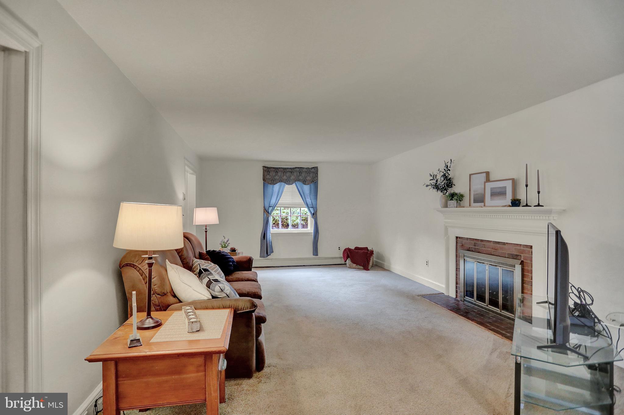 226 West Timonium Road Lutherville-Timonium, MD 21093 - Photo 11 of 56 Spacious Family Room with Wood Burning Fireplace
