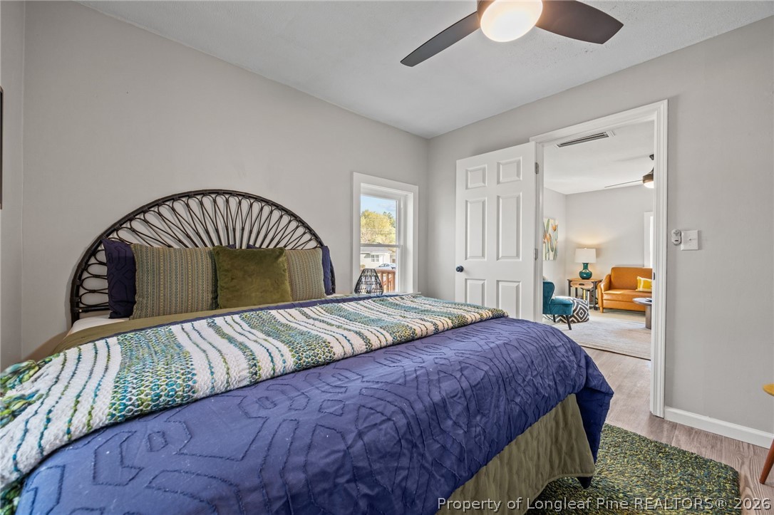 625 Eva Circle Spring Lake, NC 28390 - Photo 6 of 28 a bedroom with a bed and window