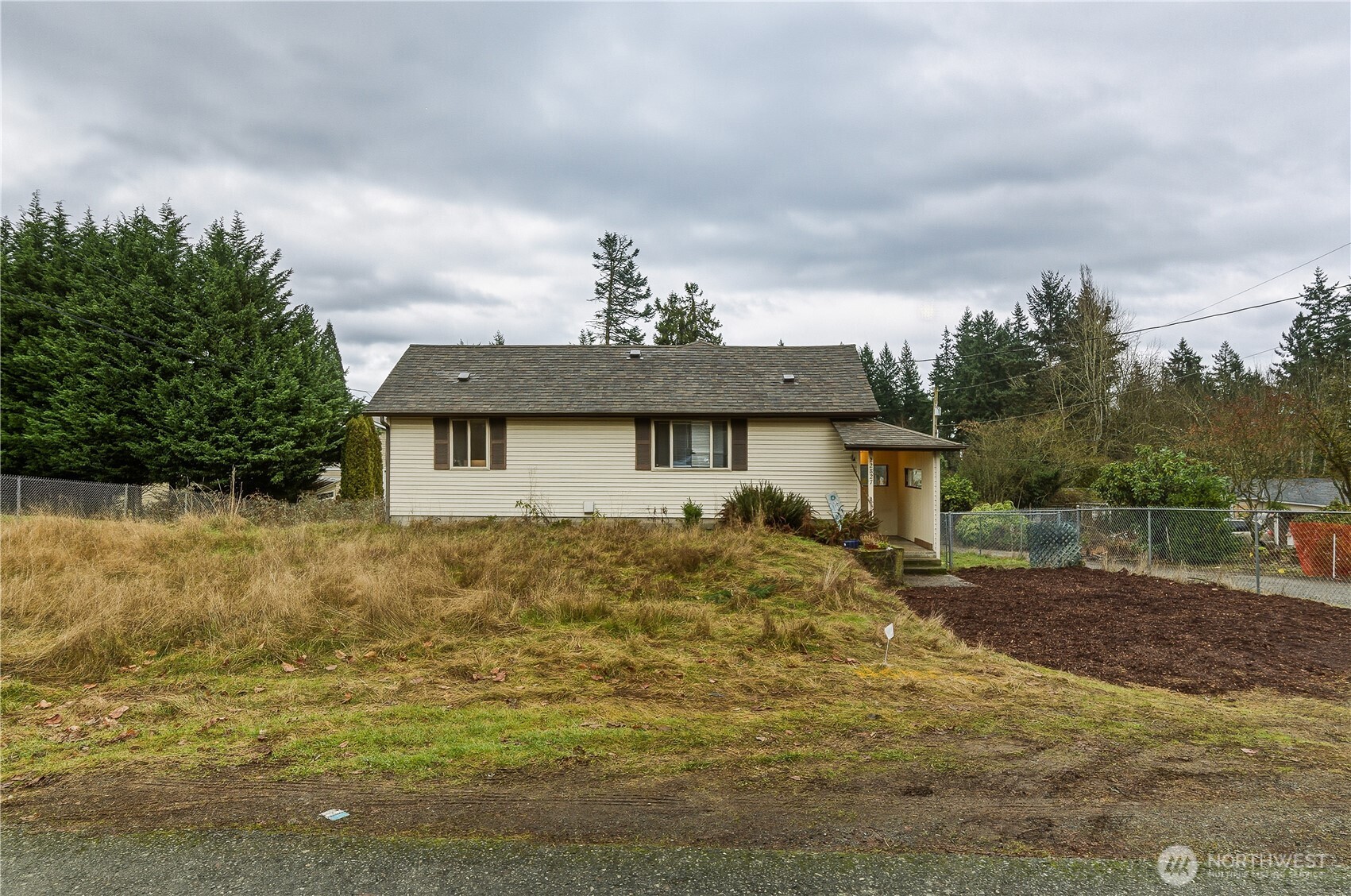 22827 Meridian Avenue South Bothell, WA 98021 - Photo 3 of 27 a front view of house with yard
