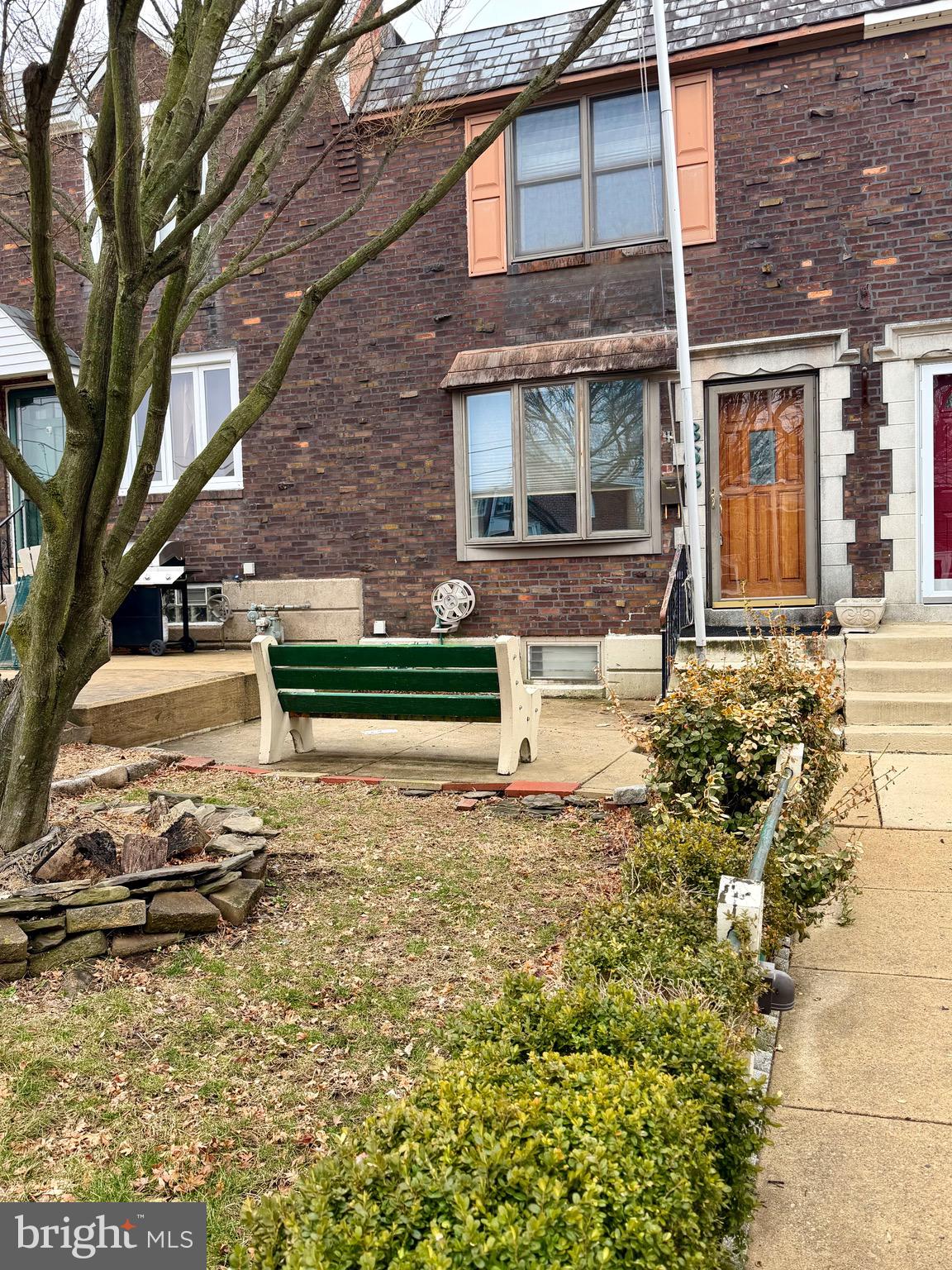 868 Fairfax Road Drexel Hill, PA 19026 - Photo 1 of 16 a front view of a house with a yard