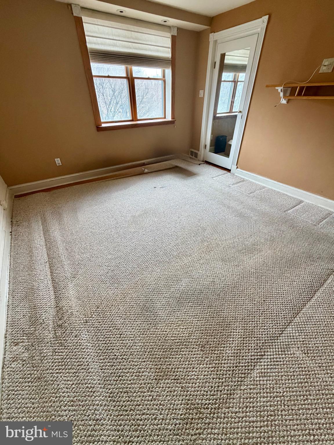 868 Fairfax Road Drexel Hill, PA 19026 - Photo 9 of 16 an empty room with windows