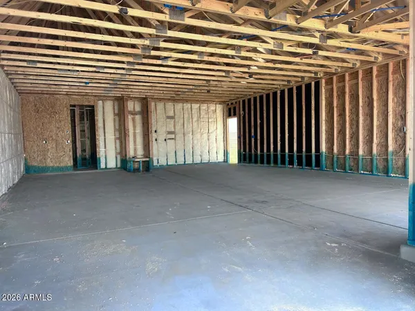 a view of a building with floor to ceiling windows