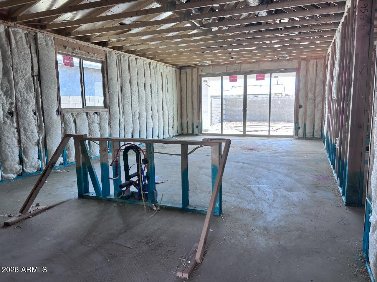 2651 Homesteaders Road San Tan Valley, AZ 85140 - Photo 5 of 17 a view of a room with gym equipment