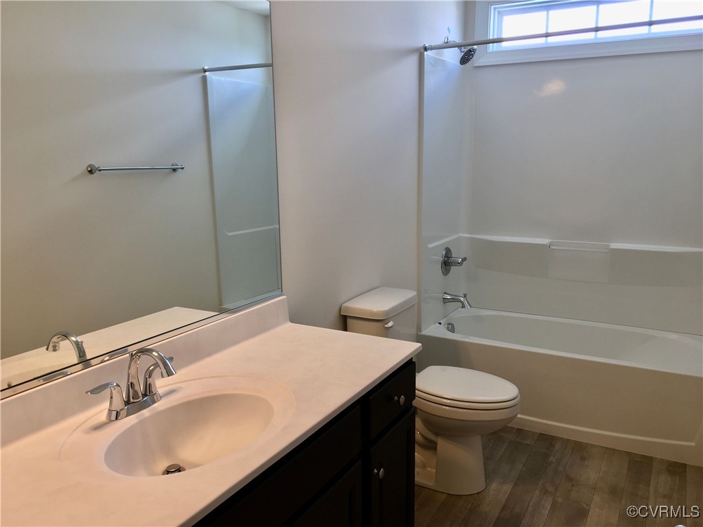 8423 Bishops Park Drive Mechanicsville, VA 23116 - Photo 16 of 17 a bathroom with a sink toilet and shower