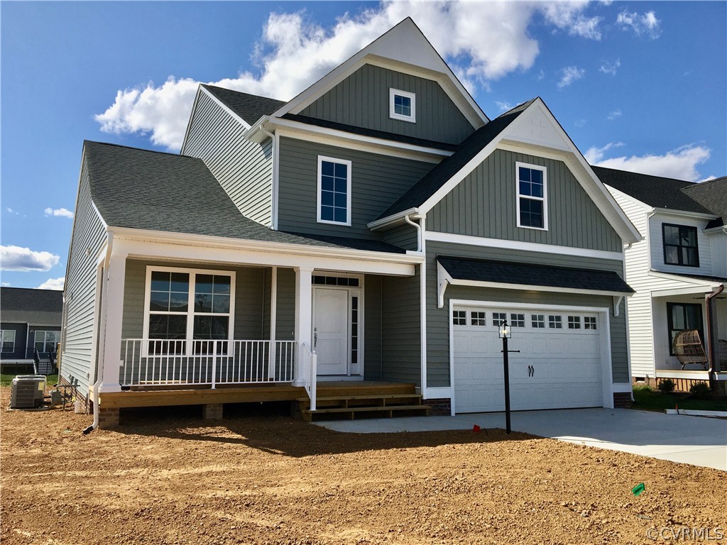 8423 Bishops Park Drive Mechanicsville, VA 23116 - Photo 2 of 17 a view of a house with a yard