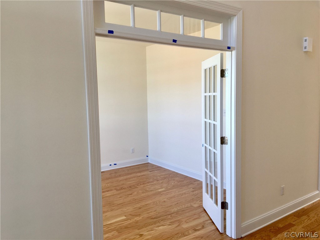 8423 Bishops Park Drive Mechanicsville, VA 23116 - Photo 5 of 17 a view of a hallway with wooden floor and entryway