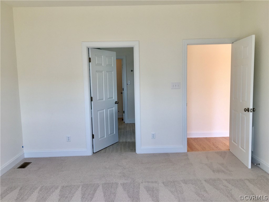8423 Bishops Park Drive Mechanicsville, VA 23116 - Photo 9 of 17 an empty room with windows