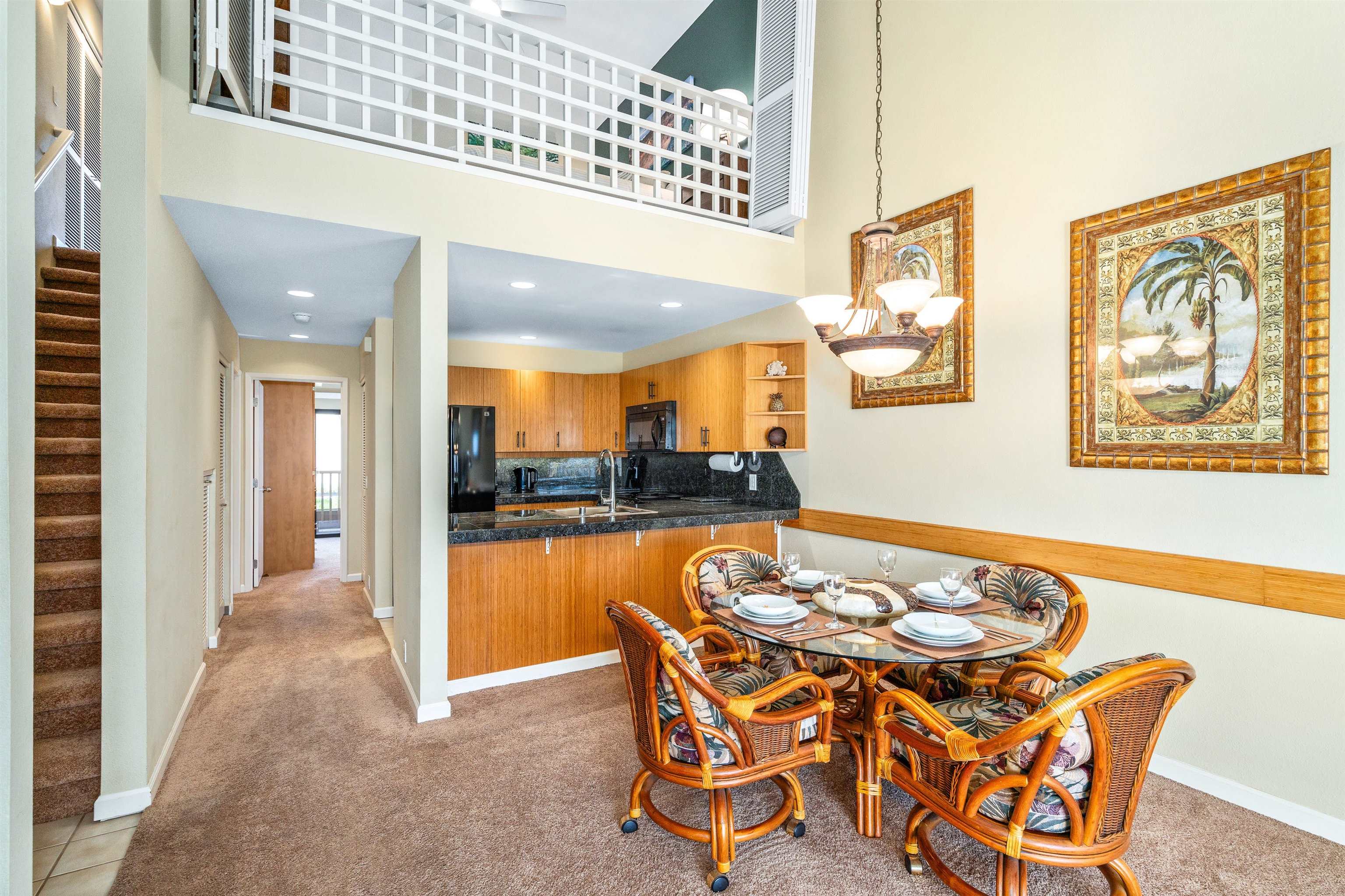 2777 South Kihei Road, Unit G207 Kihei, HI 96753 - Photo 14 of 50 a dining room with furniture and a floor to ceiling window