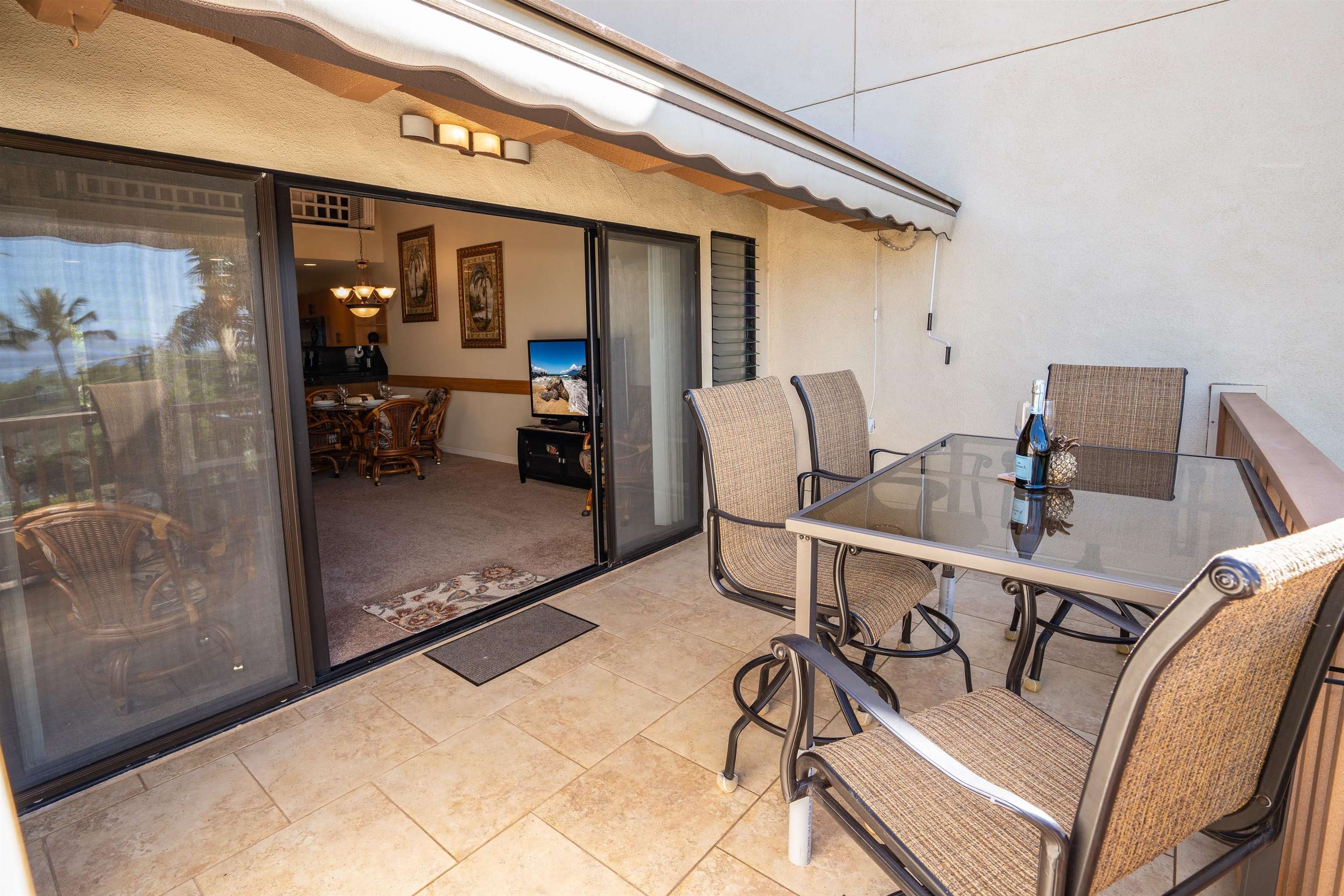 2777 South Kihei Road, Unit G207 Kihei, HI 96753 - Photo 15 of 50 a balcony with table and chairs