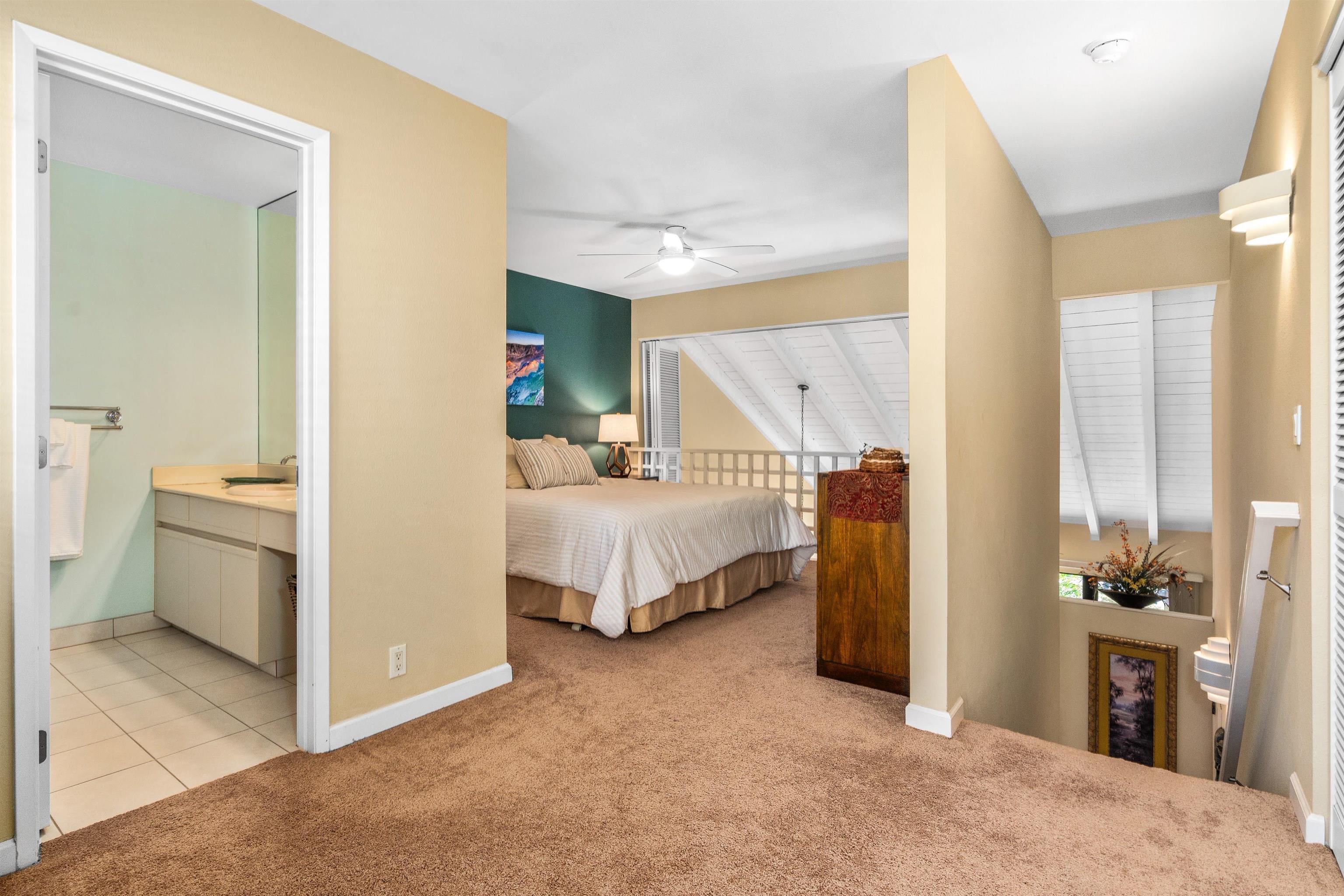 2777 South Kihei Road, Unit G207 Kihei, HI 96753 - Photo 28 of 50 a view of a bedroom with bed and window