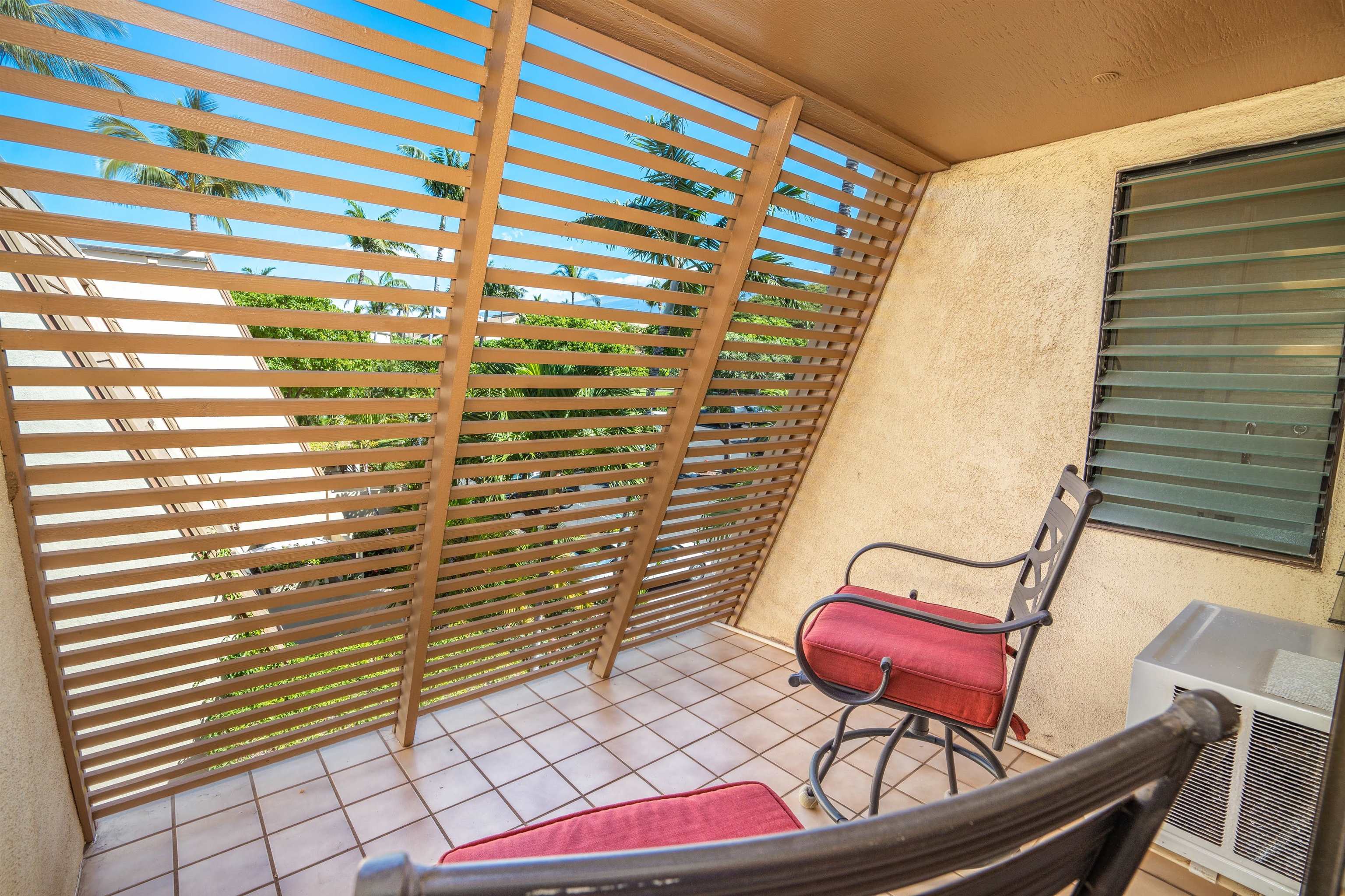 2777 South Kihei Road, Unit G207 Kihei, HI 96753 - Photo 33 of 50 a view of a room with lounge chair and a rug