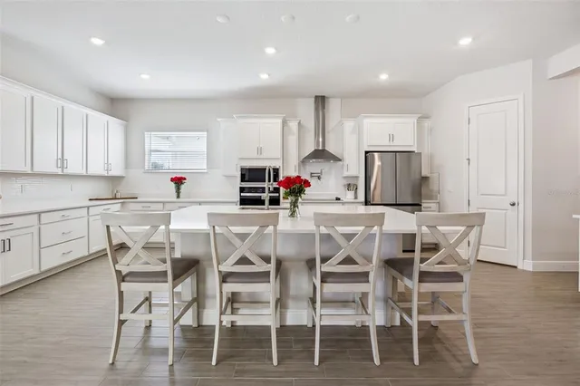 a white bath tub sitting in a bathroom