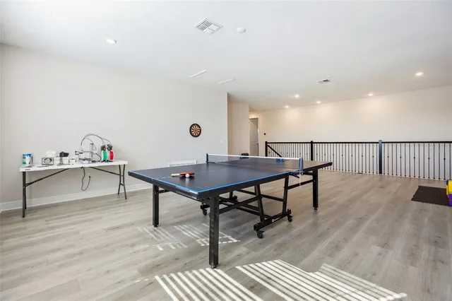 a view of kitchen with furniture and wooden floor