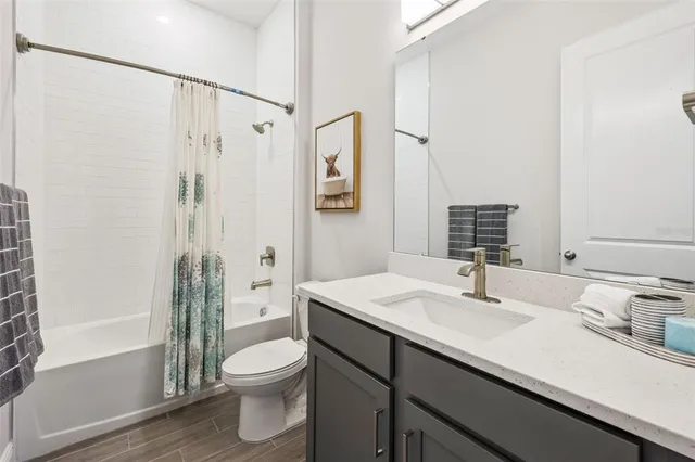 an aerial view of residential houses with outdoor space and swimming pool