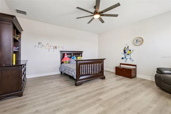 an aerial view of a house with a ocean view