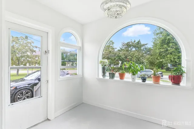 wooden floor in a room with a window