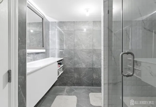 a bathroom with a shower and a toilet