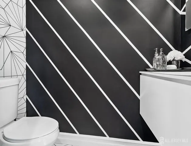 a bathroom with a toilet and a bathtub