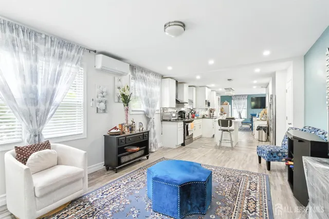 a living room with furniture and a table