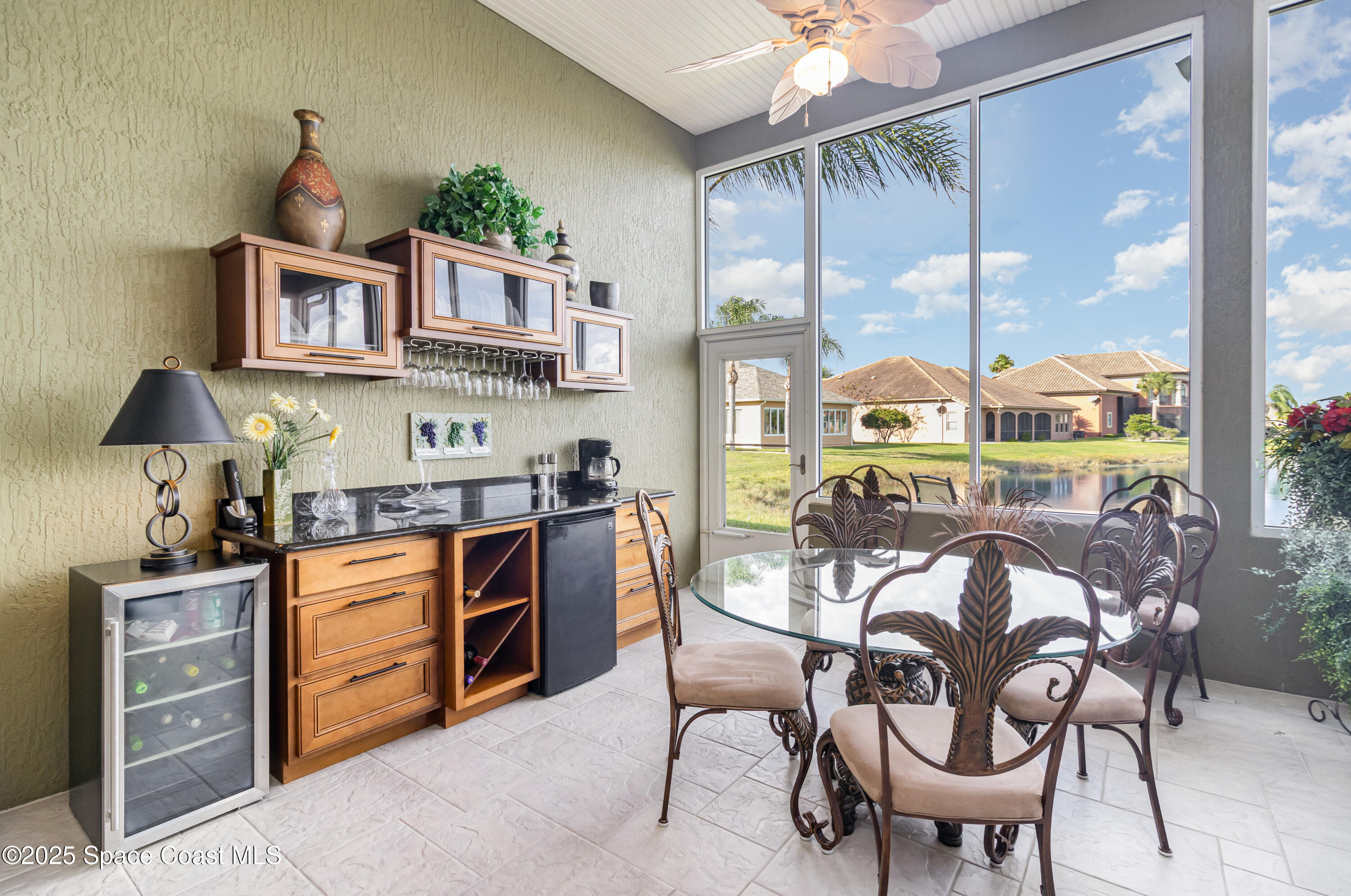 200 Harmony Lane Titusville, FL 32780 - Photo 14 of 28 a view of a dining room with furniture window and outside view