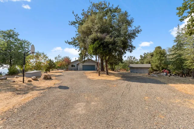 a view of a town with mountains in the background