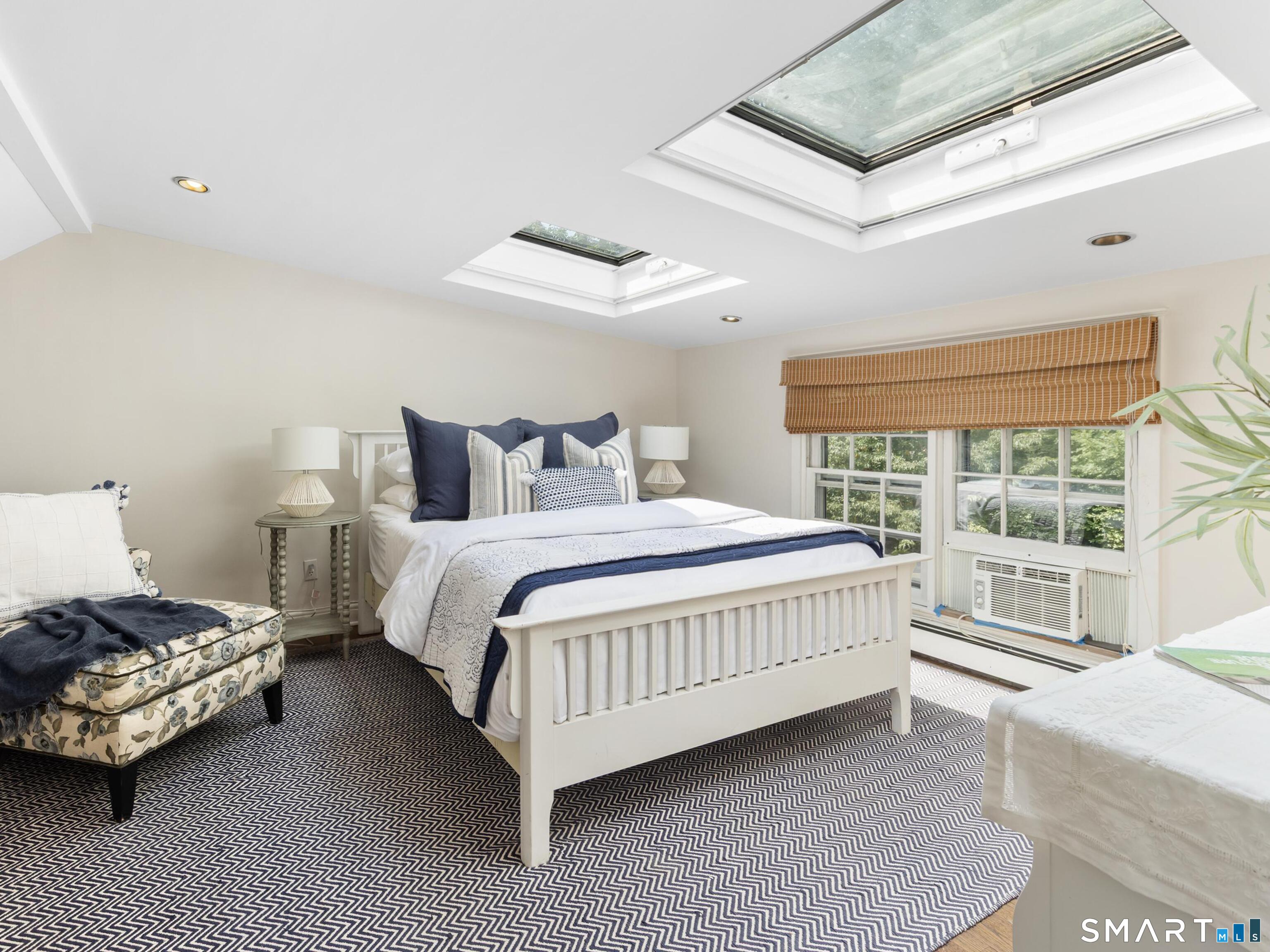 24 Good Hill Road Weston, CT 06883 - Photo 26 of 36 Bedroom 2 has skylights and an adjacent walk-in closet