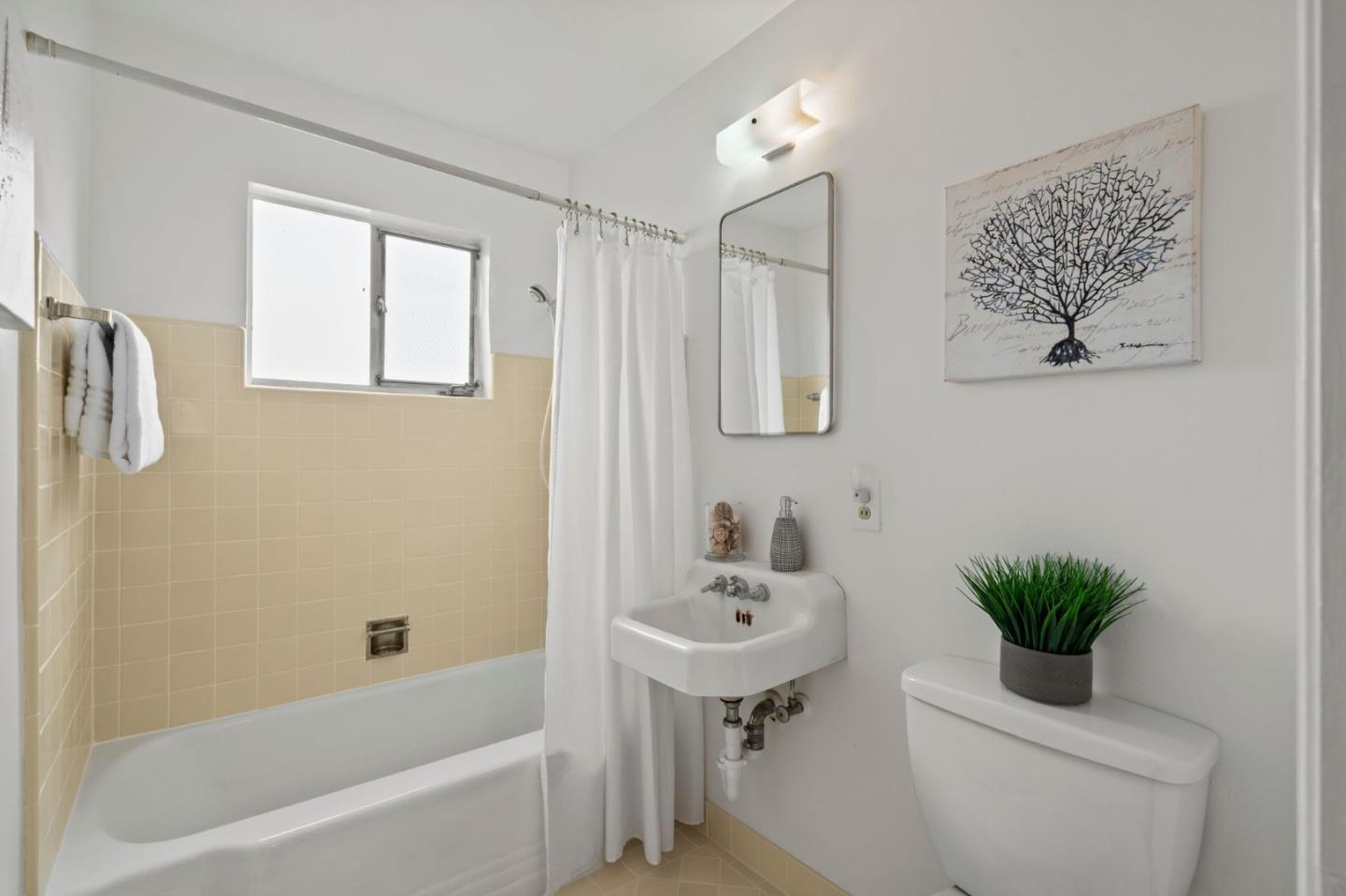 4840 Anna Drive San Jose, CA 95124 - Photo 5 of 5 a bathroom with a sink a toilet and shower