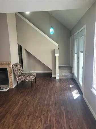 a view of entryway with wooden floor