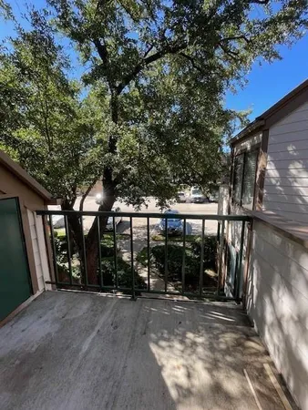 a view of backyard with green space