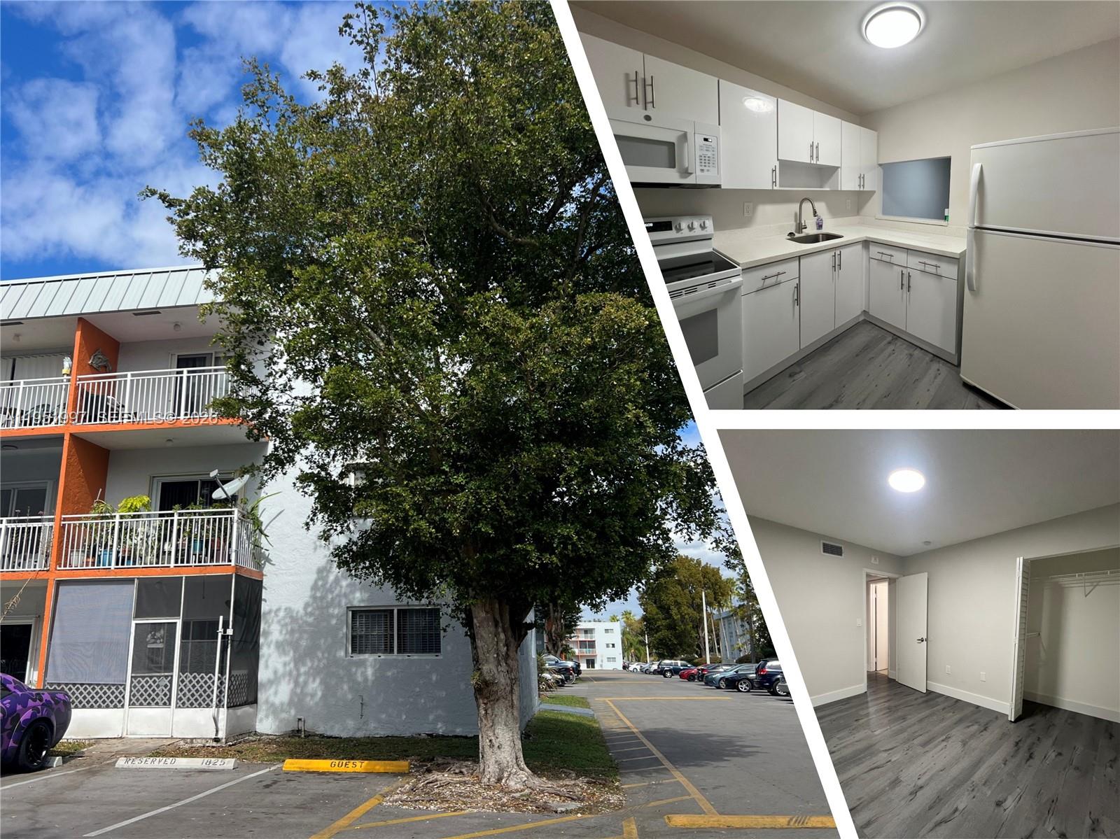 a view of a kitchen with a sink and dishwasher a fireplace with wooden floor